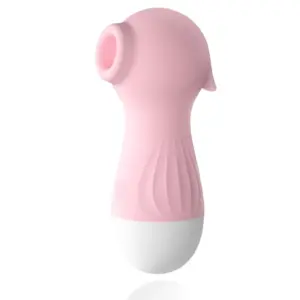 Soft pink Mini Seahorse Sucking Vibrator SeaLora with a compact curved design, textured silicone body, and a white rounded base.