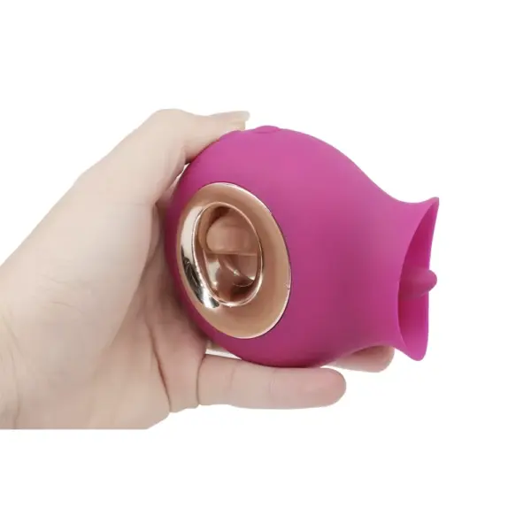 licking vibrator held in hand to showcase it's size