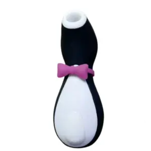 Front-facing view of the Penxie – Penguin Clitoral Sucking Vibrator featuring a black and white penguin-shaped body with a pink bow tie and rounded suction tip.