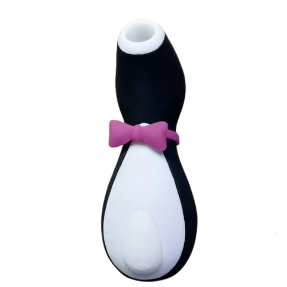 Front-facing view of the Penxie – Penguin Clitoral Sucking Vibrator featuring a black and white penguin-shaped body with a pink bow tie and rounded suction tip.