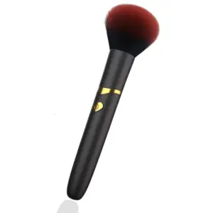 Sleek black Makeup Brush Vibrator by PixiePizzazz featuring ultra-soft bristles and a gold accent band with a heart-shaped power button on the handle.