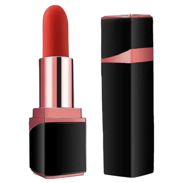 A sleek black and rose gold lipstick tube is shown, with the cap removed to reveal a bold red-orange lipstick bullet. The design is modern and chic, with a glossy finish and a pink accent on the cap for a stylish contrast.