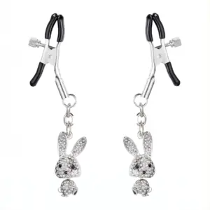 Pair of jeweled nipple clamps featuring adjustable tips and dangling rhinestone bunny figures for a playful, decorative touch.