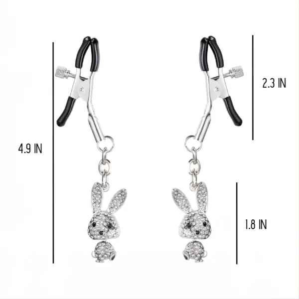 Pair of silver nipple clamps with soft black tips and sparkling bunny pendants, labeled with measurements: 4.9 inches total length and 1.8-inch bunny charms.