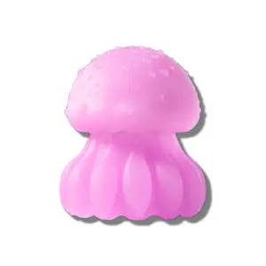 A soft pink jellyfish-shaped vibrator standing upright, showcasing its rounded bumpy top and ribbed lower half for external stimulation.