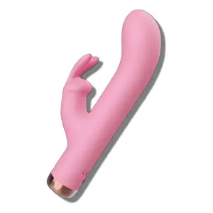 Pink Mini Rabbit Vibrator featuring dual stimulating tips and a slightly curved shaft for targeted internal and clitoral stimulation.