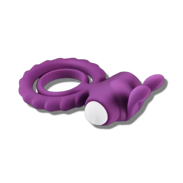 Side angle view of the purple rabbit cock ring vibrator showing contoured silicone texture, dual rings, and vibrating bullet housed in bunny ears.