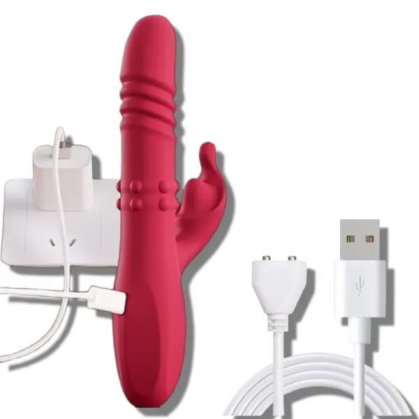 Thrusting Rabbit Vibrator displayed alongside a USB magnetic charging cable and wall adapter, highlighting its rechargeable design.