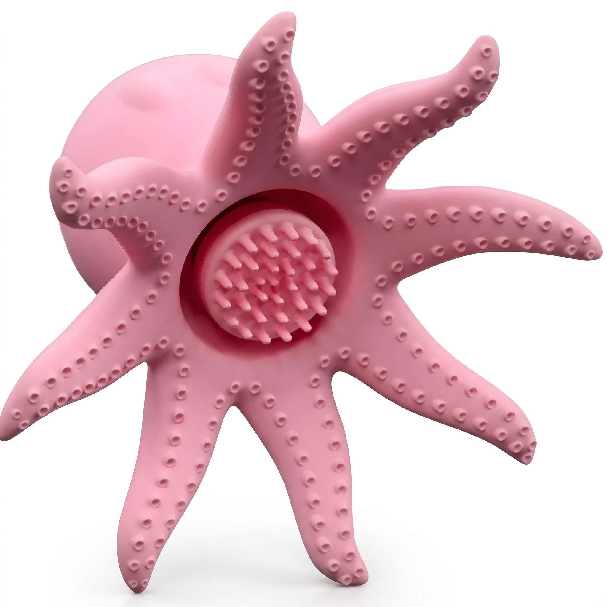 Bottom view of OctoVibes pink octopus-shaped stimulator showing textured suction center and detailed silicone tentacles