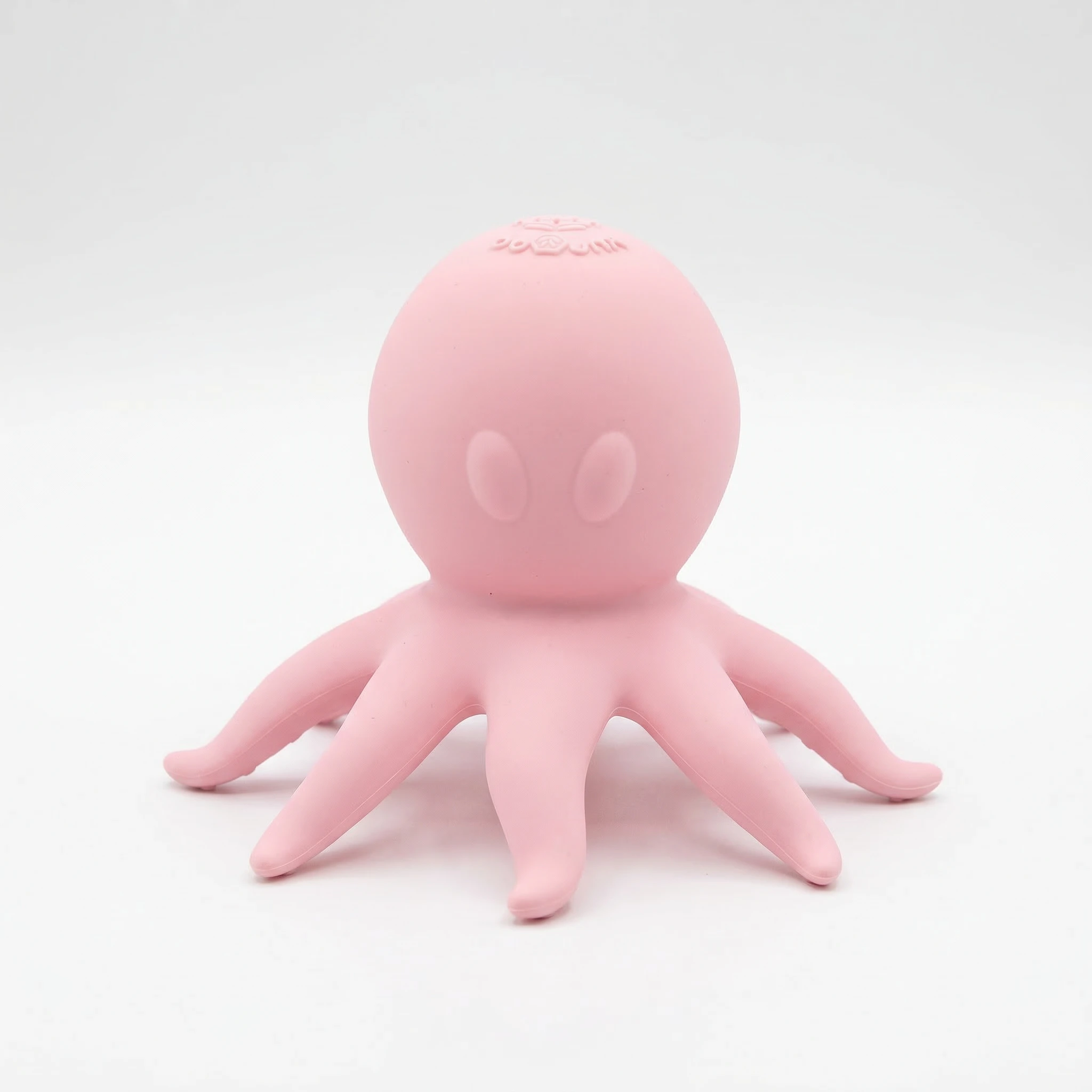 OctoVibes pink octopus-shaped clitoral stimulator with soft silicone tentacles on a white background