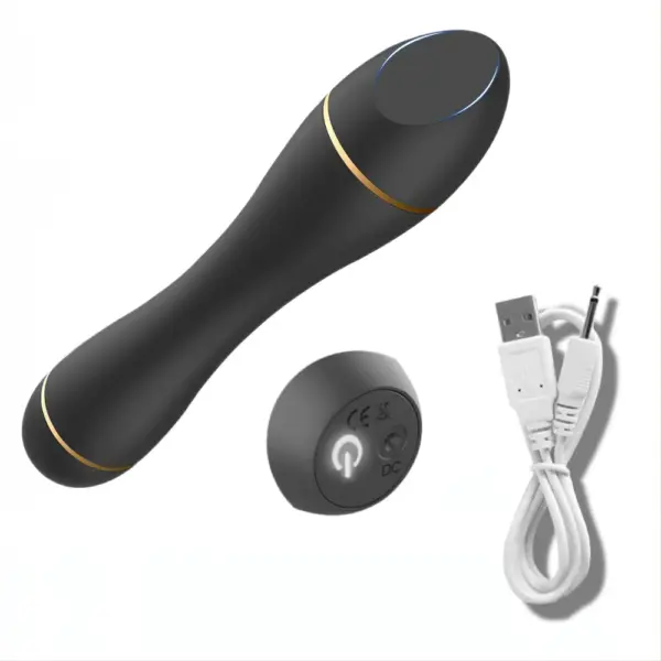 A flat head bullet vibrator displayed with its round charging base and a USB cable, highlighting its rechargeable convenience.