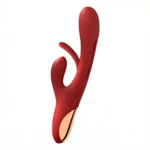 Side view of Rabbit Vibrator With Flapping Tongue in red silicone with ergonomic curve and gold accent base