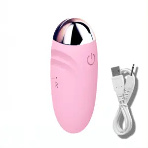 Side view of the Small Egg Vibrator Wireless with a visible charging port labeled “DC,” and a USB charging cable included, emphasizing its rechargeable and wireless functionality.