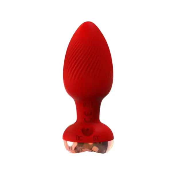 Profile view of the red ribbed silicone Remote Control Vibrating Butt Plug – The Murmur standing upright on a white background