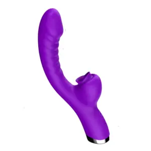 A purple silicone Dual Tongue Licking Rabbit – Flutter Flick vibrator shown at a three-quarter angle, highlighting its gently ridged G-spot shaft and the soft, tongue-shaped clitoral stimulator beneath.