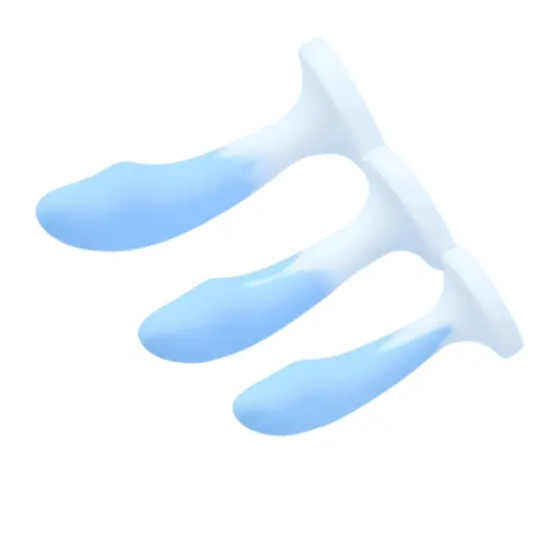 Side-profile view of the Blue and White Silicone Plug-Gentle Vice plugs arranged small to large, lying horizontally to highlight their ergonomic curve and seamless silicone finish. The gradient transitions from crisp white at the base to soft blue at the tip, illustrating comfortable insertion and sturdy base support.