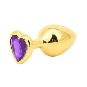 Butt Plugs With Jewel – Glitzie shown with a glossy gold body and a rich purple heart jewel that adds a vibrant, regal touch to the base.