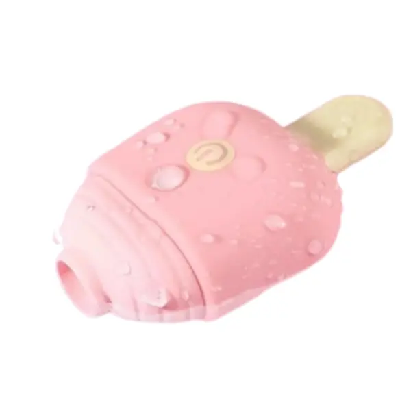 Lustful Treat’s Mini Popsicle Suction Vibrator shown with water droplets on its body, highlighting its waterproof, easy-to-clean silicone finish.