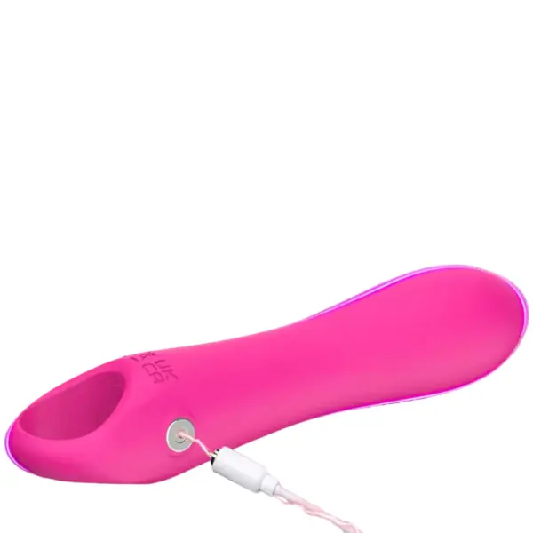 Quiver Queen’s Silicone Flexible Dildo Vibrator shown connected to a charging cable, emphasizing its magnetic USB rechargeable design and seamless silicone surface.