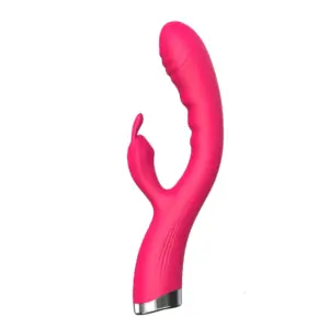 Angled view of the pink Flutter Flick vibrator showing its gently curved silicone shaft with textured ridges and a small rabbit-style clitoral stimulator arm.