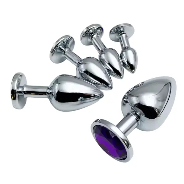Five metallic silver butt plugs of varying sizes=