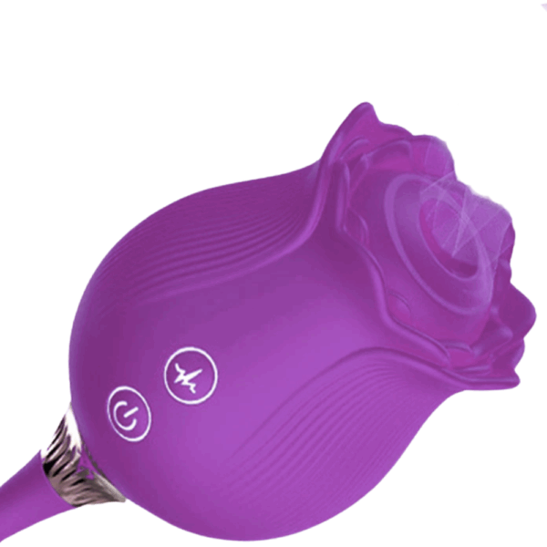 Close-up of the purple silicone rose-shaped clitoral stimulator head on the Rhapsody Ride, showing detailed petals and central suction nozzle against a plain white background