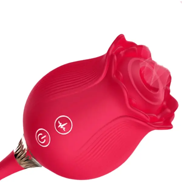 Close-up of the pink silicone rose-shaped clitoral stimulator head on the Rhapsody Ride, showing detailed petals and central suction nozzle against a plain white background.