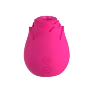 Close-up of the Blossom Vibes rose suction and egg vibrator’s pink silicone tulip-shaped suction head on a white background