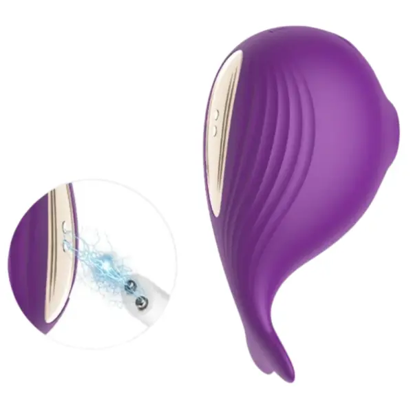 Back view of the purple 7 Modes Whale Sucker showing ribbed texture and USB charging port with lightning graphic detail.