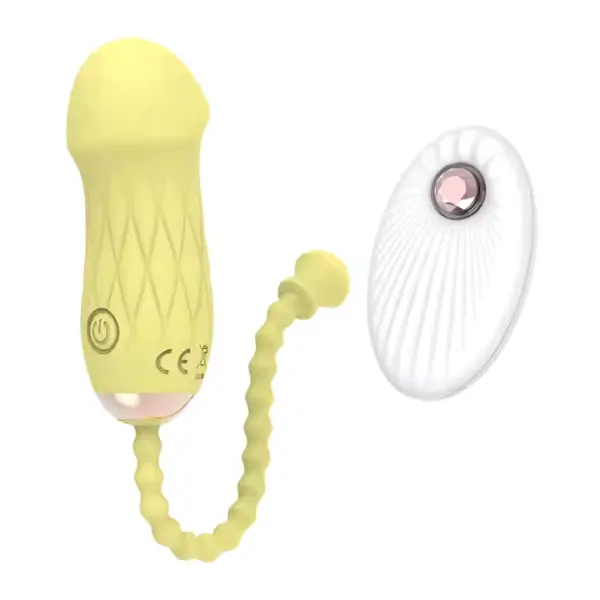 The Remote Control Love Egg-Luxe Pebble in soft lemon yellow sits next to its matching white remote control. Its ergonomic silicone shell and textured retrieval tail highlight user-friendly design and seamless remote operation.