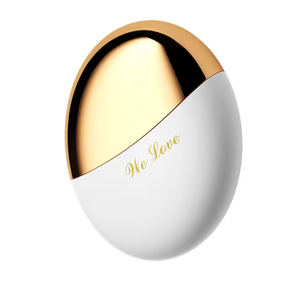 The white and gold Luxury Clitoral Suction Vibrator – Lustful Lure featuring a smooth, round silhouette with gold metallic top and “We Love” written in cursive.