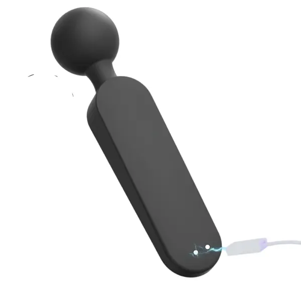 Rear view of the Wand Massager Vibrator – Wanda connected to a magnetic charger, showing contact point sparks and sleek matte black finish.