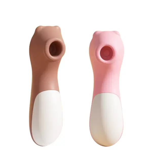 Clit Suction Vibrator – Cubby displayed in both mocha and pink color options, featuring soft rounded forms and identical suction head design.