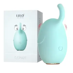Elephant Shaped Mini Bullet-Trunk Tickle stands beside its minimalist white retail box, printed with the LILO logo and a playful elephant graphic. The aquamarine silicone contrasts with the clean packaging, showcasing a premium unboxing experience.