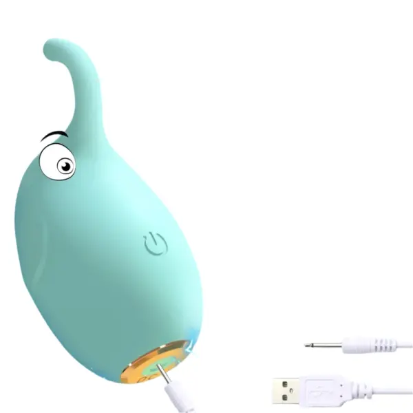 Elephant Shaped Mini Bullet-Trunk Tickle lies horizontally with its gold-plated magnetic charging port engaged by the included USB cable, illustrating the toy’s convenient recharge system. The compact form factor and simple plug-and-play connector underscore its travel-friendly power solution.