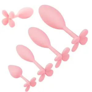 Silicone Butt Plug – SilkiPop collection displayed in four sizes, each with a teardrop bulb and flower-petal style base, ideal for progressive play.
