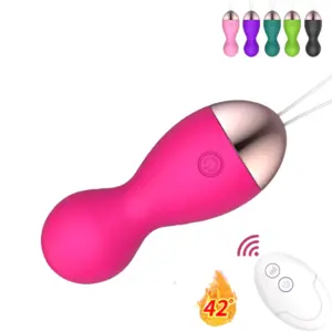 Close-up of the Heated Egg Vibrator – WarmBlush in hot pink with rose gold top, white remote, heat icon showing 42°C, and thumbnail color variants displayed above.