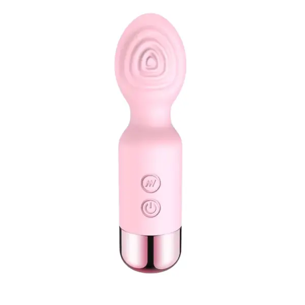 Mini Rechargeable Wand – Flickette in soft blush pink, showcasing the same rippled stimulation head and compact design finished with a metallic rose-gold base.