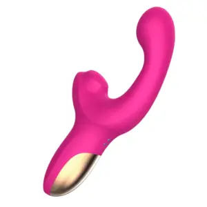 A bright pink Ergonomic Dildo With Suction Vibrator – Satin Rhythm featuring a curved shaft, rounded tip, and built-in suction stimulator at the base with a gold-toned handle.