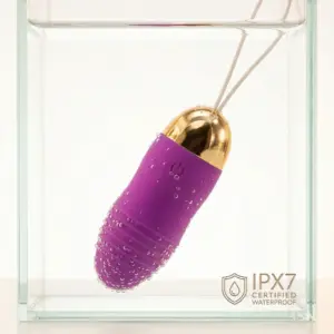 The Remote Control Egg Vibrator – Velvet Pulse partially underwater with bubbles and ripples, demonstrating its waterproof design and smooth finish.