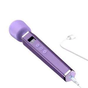 The Cordless Wand Vibrator-Silken Touch is shown connecting to a USB cable via its magnetic base port, with glowing spark graphics emphasizing secure attachment. This cordless charging system underscores the wand’s travel-friendly design and hassle-free power-up experience.