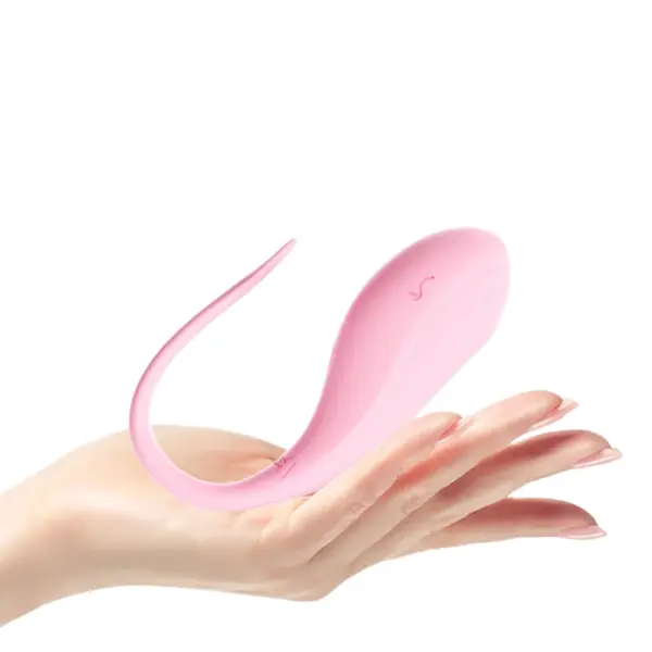 Egg Vibrator for Couples – DuoDrop held in an open palm showcasing its compact, discreet size and velvety silicone surface ideal for partner play.