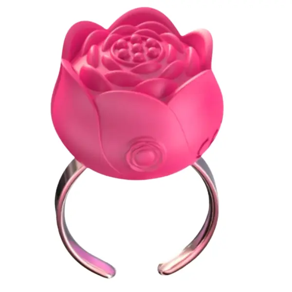 The pink version of the Bloomé Discreet Clitoral Stimulator Ring featuring a soft-touch rose bud top and metallic band.