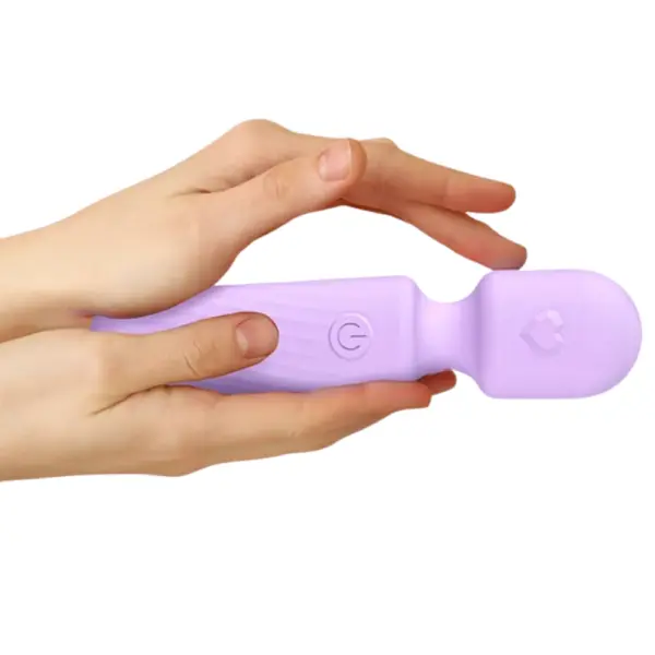 The Flexora 270° Flexible Wand Vibrator shown held between two hands for scale, displaying its compact size and soft matte finish.