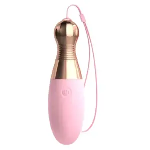Close-up of the Strikella vibe egg shaped like a mini bowling pin, featuring a glossy gold top, pink silicone body, and a power button near the base.