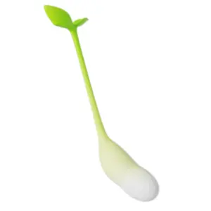 Slim, soft silicone vibrator shaped like a green stem with a leaf at the end and a white egg-shaped tip, resembling a plant sprout.