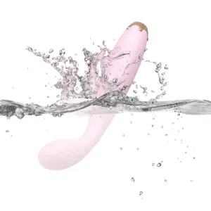 Bendable G-Spot Vibrator Bendelle partially submerged and splashing in water, emphasizing its waterproof design and smooth, curved silicone body.