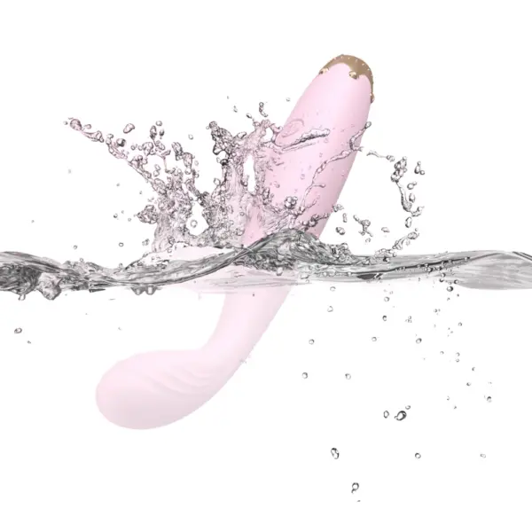 Bendable G-Spot Vibrator Bendelle partially submerged and splashing in water, emphasizing its waterproof design and smooth, curved silicone body.