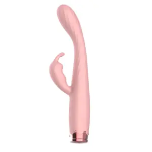 Flexible Dual Stim Rabbit – FlexPulse in soft blush pink silicone with a twisted curved shaft and defined clitoral arm for targeted dual stimulation.
