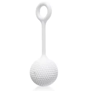 Minimalist white egg vibrator shaped like a golf ball with a textured surface and flexible retrieval loop for easy use.